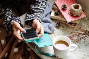 Girl, smartphone, social media — Viewfinder Victory: The Power of Purchased Instagram Reels Views